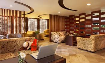 this is a photo of the arrival and departure lounge at the Melia Bali Indonesia