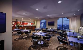 a room filled with furniture and a flat screen tv