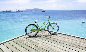 a bicycle next to a body of water