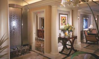 a living room with a large mirror