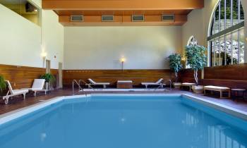 a pool next to a sink