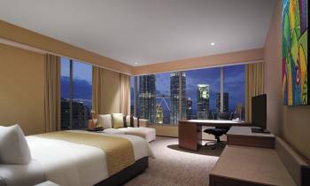 a hotel room with a large window