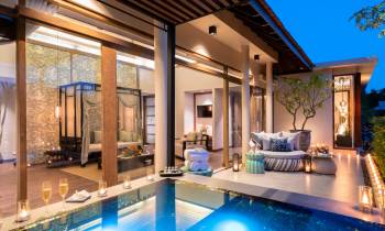 a room filled with furniture and a pool table