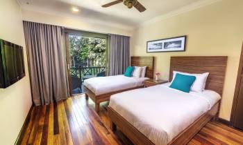 a bedroom with a bed in a hotel room