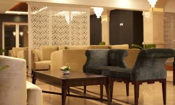 a living room with a wooden table