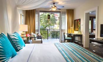 a bedroom with a bed and window in a room
