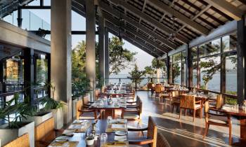 a dining room table in front of a building
