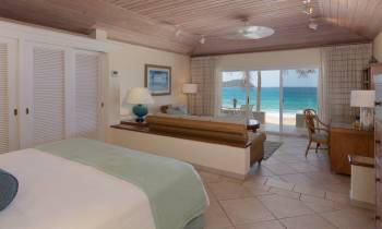 a bedroom with a large bed in a room