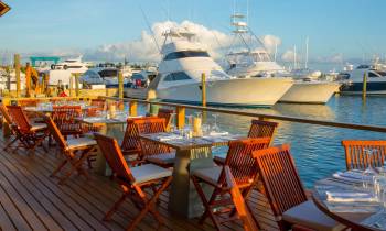 a boat sitting on top of a wooden chair
