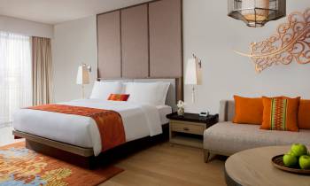 a bedroom with a bed in a hotel room
