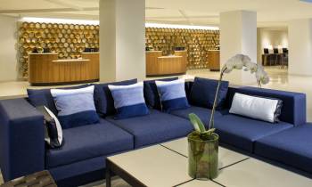 a living room with a couch and a table