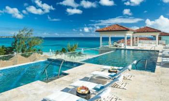 a pool next to a body of water