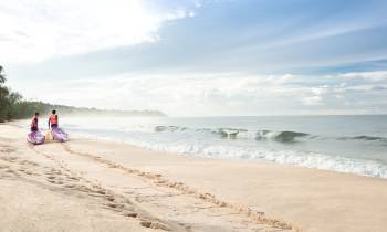 a group of people on a beach
