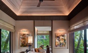 a room filled with furniture and a large window