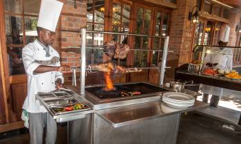 a man cooking in a kitchen