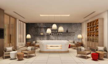 a living room filled with furniture and a large window