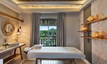 a hotel room with a large mirror
