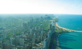 a view of a large body of water with a city in the background
