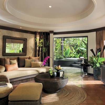 a living room filled with furniture and a large window
