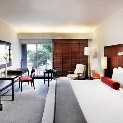 a room filled with furniture and a flat screen tv