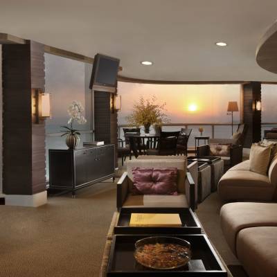 a living room filled with furniture and a flat screen tv