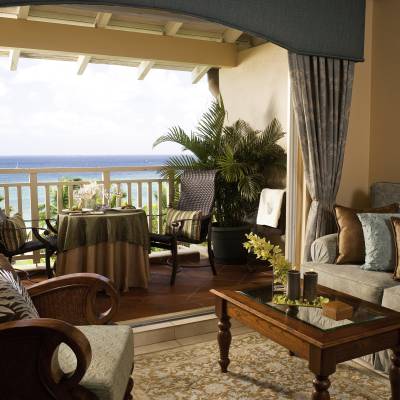 a living room filled with furniture and a large window