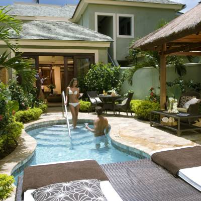 a house with a pool table in a garden