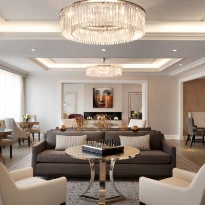 a living room filled with furniture and a fireplace