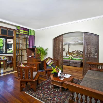 a living room filled with furniture and a fireplace