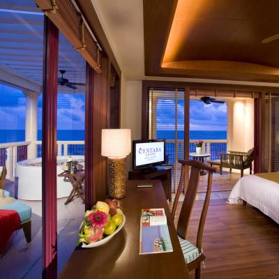 a bedroom with a large bed in a hotel room