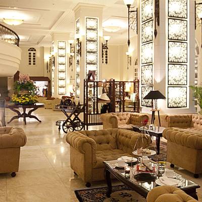 a living room filled with furniture and a large window