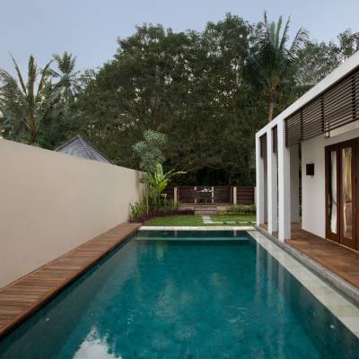 a small house in a pool of water