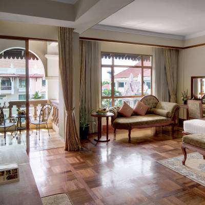 a living room filled with furniture and a large window
