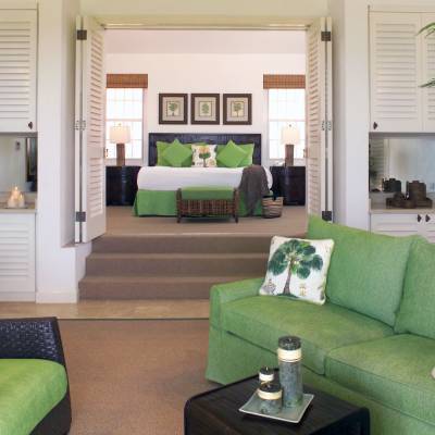 a living room filled with furniture and a large window