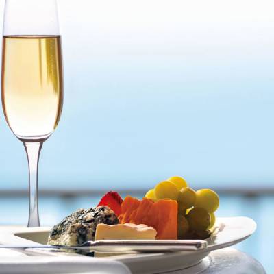 a glass of wine on a table