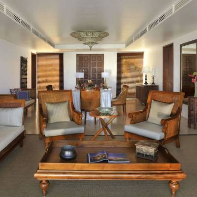 a living room filled with furniture and a fire place