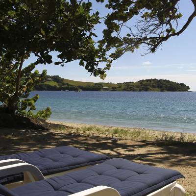 a bench in front of a body of water