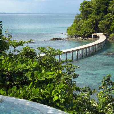 a pool next to a body of water