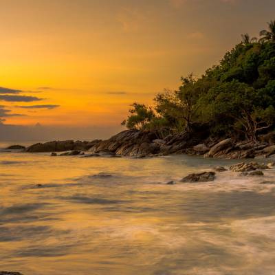 a sunset over a body of water