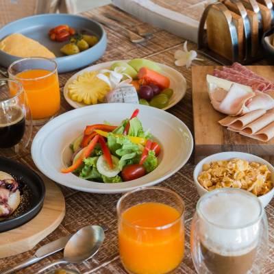 a table topped with plates of food on a plate