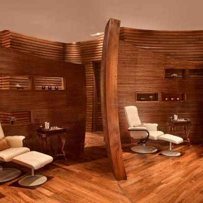 a wooden chair in a room