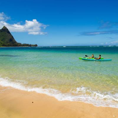 Couple kayaking at Makua beach
