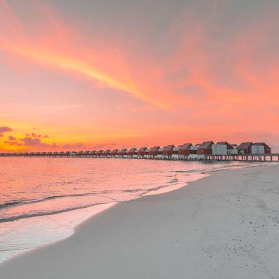 a beach next to a body of water