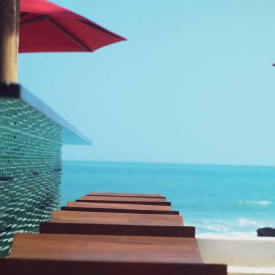 a close up of an umbrella on a beach