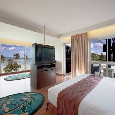 a bedroom with a large bed in a room