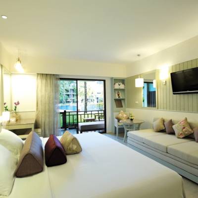 a hotel room with a large window