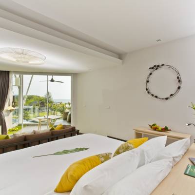 a bedroom with a large window