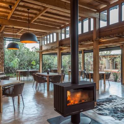 a living room filled with furniture and a fire place
