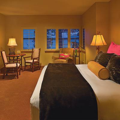 a bedroom with a bed in a hotel room