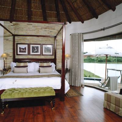 a bedroom with a wooden floor